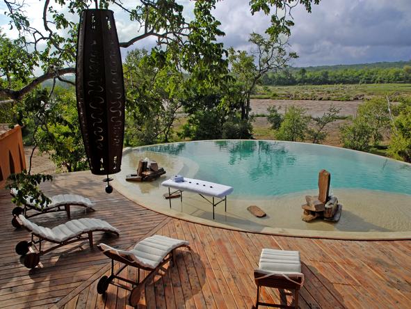 Amara Selous - pool with loungers